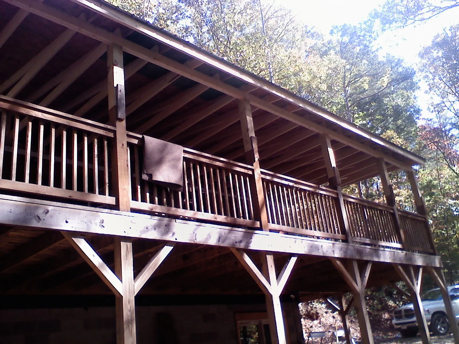 Timber framing under a new elevated porch and deck — Roof Leak Repair in Shenandoah by Roofing Brothers